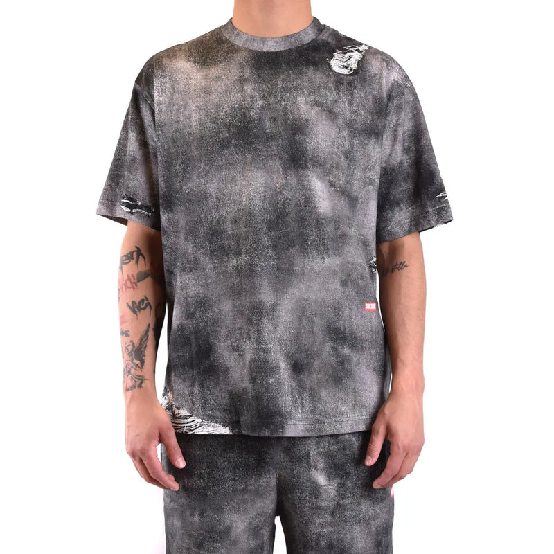 Diesel T-shirt homme en coton noir avec motif tie-dye noir et gris et détails déchirés et usés sur les manches et l'ourlet
