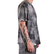 Diesel T-shirt homme en coton noir avec motif tie-dye noir et gris et manches déchirées à l'aspect usé