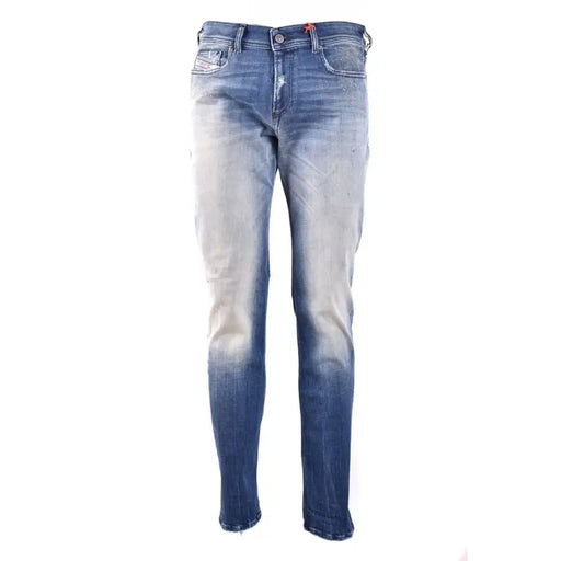 Blue faded jeans with red stitching and silver hardware.