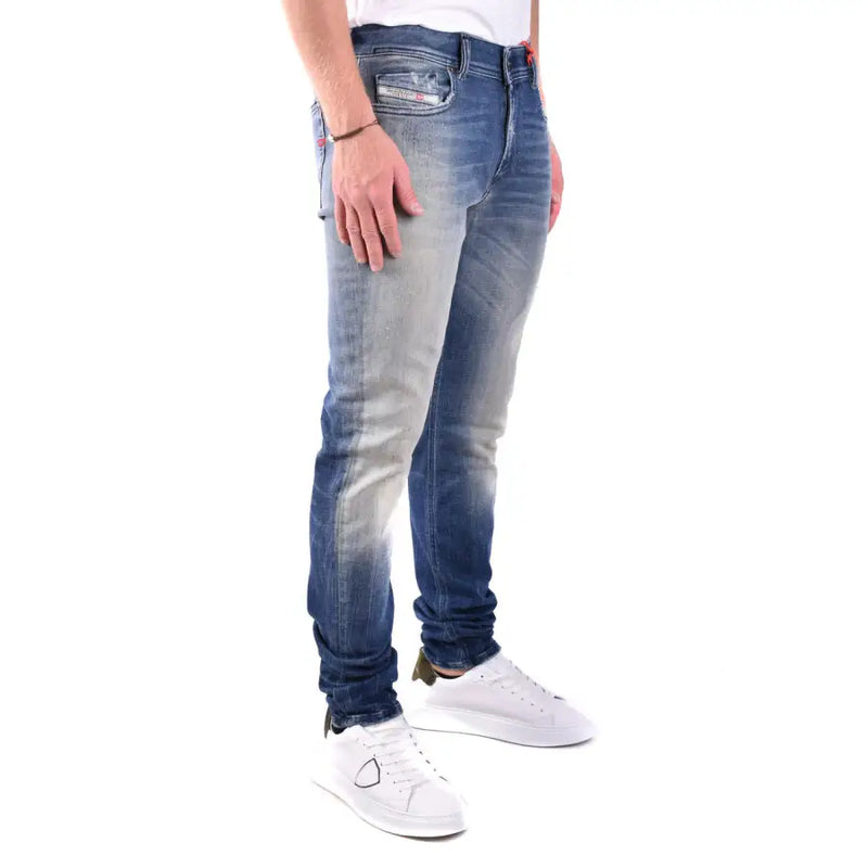 Diesel men blue cotton jeans with worn effect featuring faded gradient wash and subtle distressing details