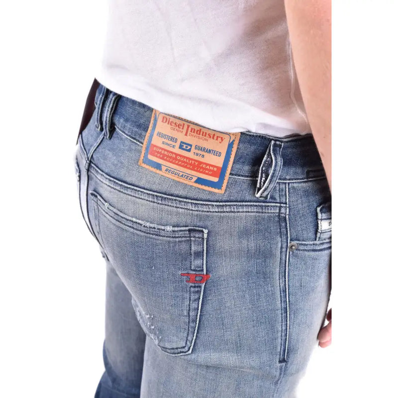 Back view of diesel men blue cotton jeans with worn effect light-wash denim and orange and blue label