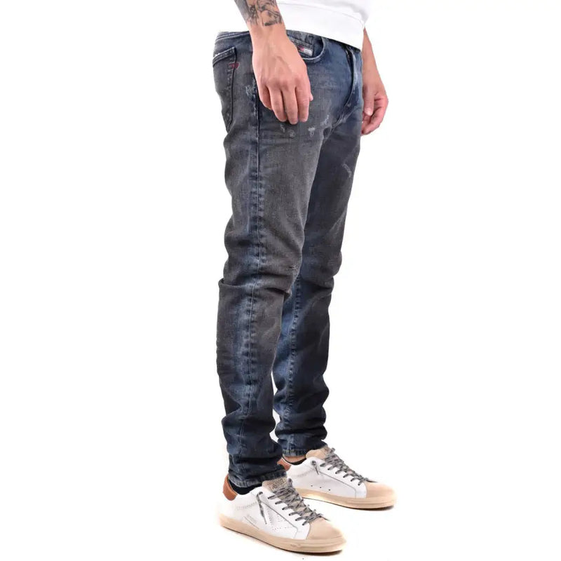 Diesel Jean homme bleu foncé effet usé, coupe slim et détails déchirés, 100 % coton