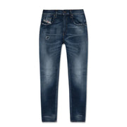Diesel Jean homme en lyocell de coton bleu foncé à effet usé, avec détails délavés et subtils.