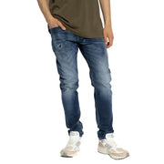 Diesel Jean homme en lyocell de coton bleu foncé délavé, coupe slim et subtils effets usés aux cuisses.