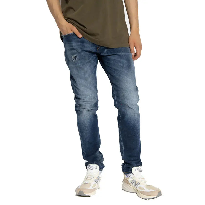 Diesel Jean homme en lyocell de coton bleu foncé délavé, coupe slim et subtils effets usés aux cuisses.