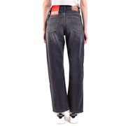 Diesel Jean noir en coton stretch pour femme, délavage foncé, coupe droite, ourlets effilochés laissant apparaître l'étiquette de la ceinture.