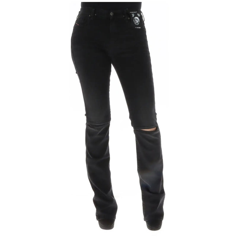 Diesel Jean noir en coton déchiré pour femme, laissant apparaître l'arrière, genoux usés et étiquette de marque sur la poche.