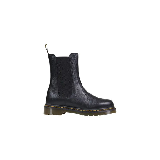 Dr. Martens black leather Chelsea ankle boots for women with yellow-stitched sole