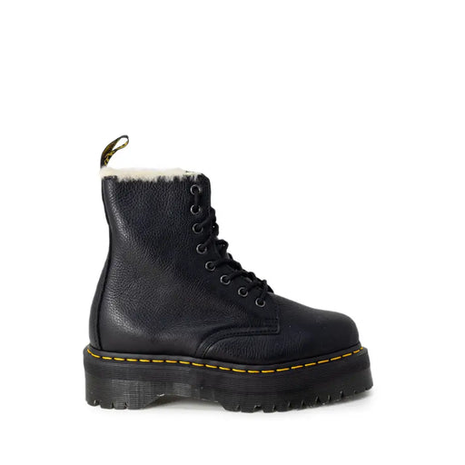Dr Martens black leather ankle boots for women shown from the back side featuring durable leather material