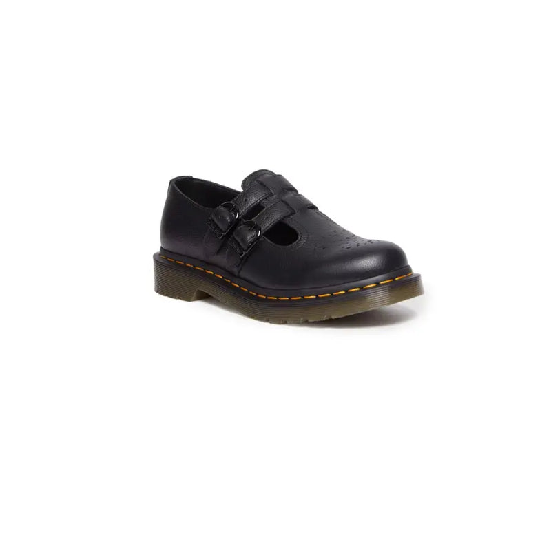 Dr martens black leather slip on shoes in size 3 showing the back side with durable leather material