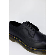 Chaussures Dr Martens pour homme en cuir noir à lacets, pointure 3, montrant l'arrière de la chaussure.