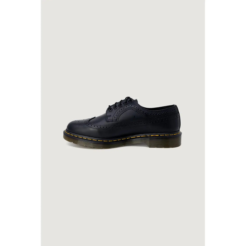 Chaussures Dr. Martens pour homme, en cuir noir, style brogue, à lacets, avec surpiqûres jaunes, pointure 3, vues de l'arrière.