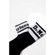Pair of black and white striped crew socks for Dr Martens Men Black Slip On footwear
