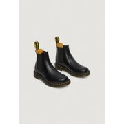 Bottes Dr. Martens homme en cuir noir et polyester, idéales pour le printemps et l'été, modèle n° 22227001 (vue de dos).