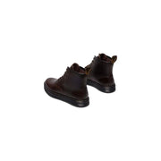 Bottes Dr. Martens Brookline Chukka pour homme en cuir marron foncé, montrant l'arrière de la chaussure