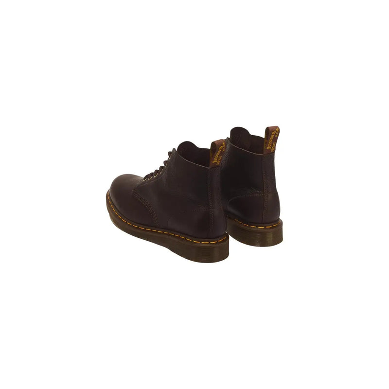 Bottines Dr. Martens pour homme en cuir marron foncé, modèle Ambassador, montrant l'arrière de la chaussure