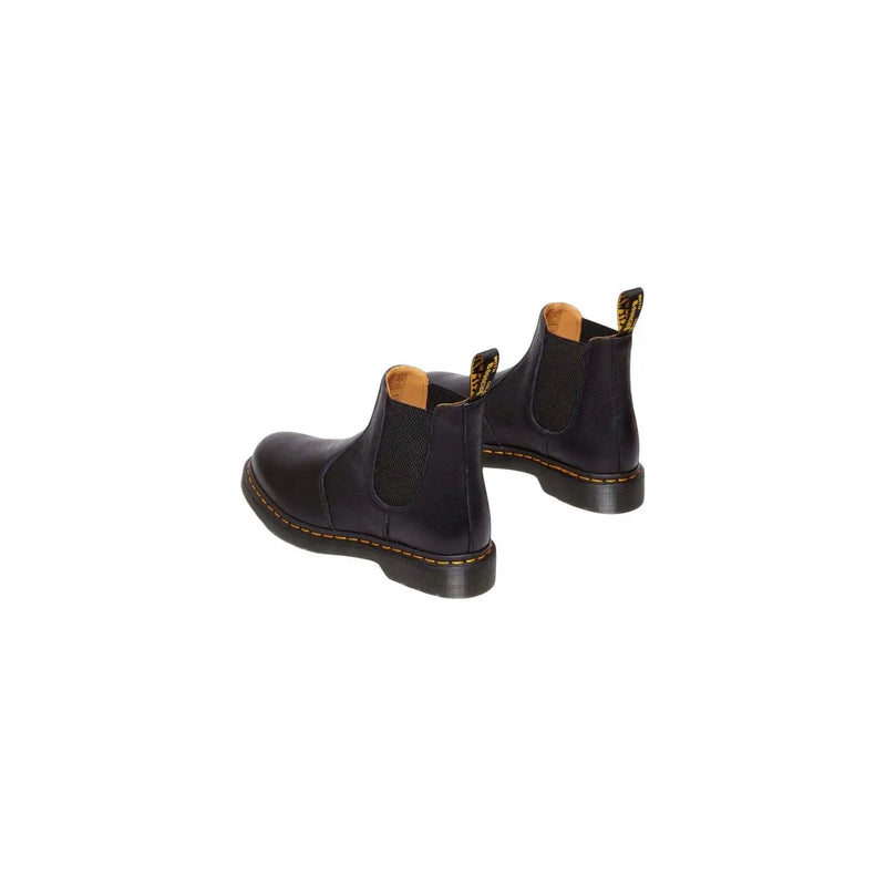 Dr martens men leather ankle boots in black with elastic side panels and yellow stitching in chelsea style