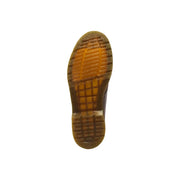 Bottes Dr. Martens pour homme, modèle Ambassador, en cuir marron et semelle en caoutchouc classique à motif quadrillé.