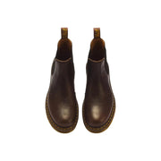 Bottines Chelsea en cuir marron foncé avec surpiqûres jaunes et semelles en caoutchouc beige, modèle classique Dr. Martens 2976