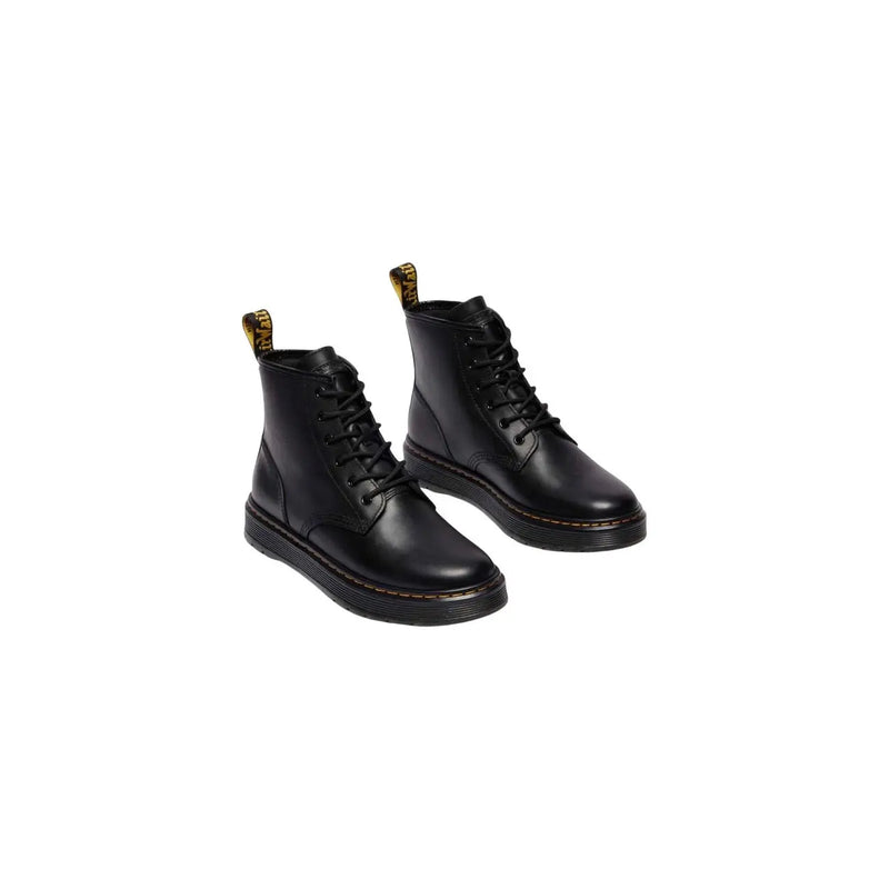 Bottes chukka Dr Martens pour homme en cuir noir, montrant l'arrière avec un cuir lisse et une semelle robuste.