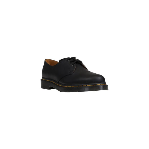 Chaussures Dr. Martens pour homme en cuir noir, modèle classique 1461, présentant une tige en cuir noir et un design classique à lacets.