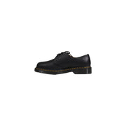 Chaussures Dr. Martens Classic 1461 pour homme en cuir noir, mettant en valeur le design de la face avant