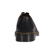 Chaussures Dr. Martens pour homme en cuir noir, modèle classique 1461 : vues de face et de profil.
