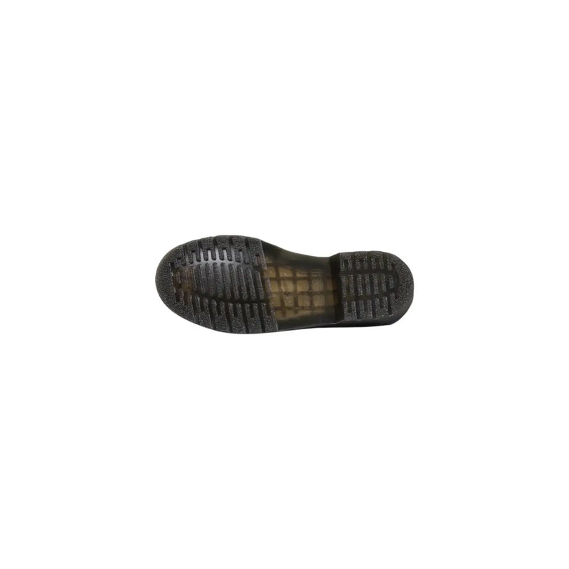 Semelle extérieure en caoutchouc noir avec motif quadrillé et semelle intermédiaire translucide jaunâtre sur les chaussures Dr. Martens Classic 1461 pour homme, en cuir noir.