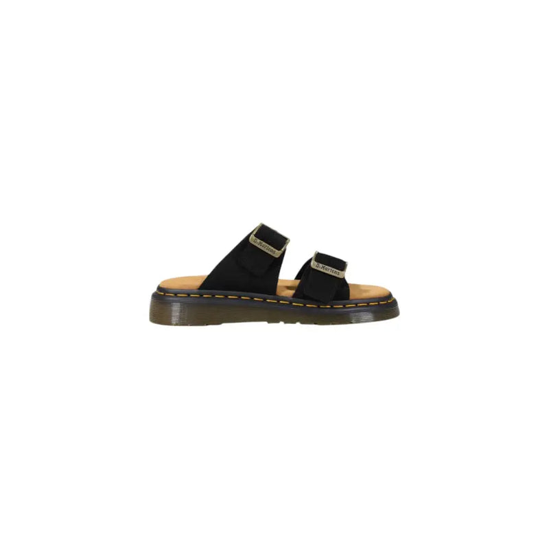 Pantoufles Dr Martens pour homme, en cuir noir, avec deux brides à boucle dorées et semelle en caoutchouc beige, modèle à bout ouvert