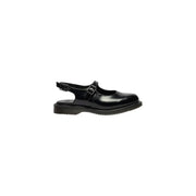 Black patent leather mary jane sandal with buckle strap and rubber sole by Dr Martens for women