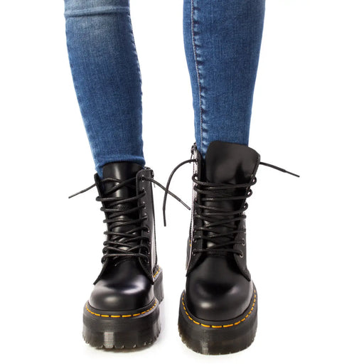 Bottes Dr. Martens pour femme en cuir noir, pointure 4, vues de l'arrière, détail du talon