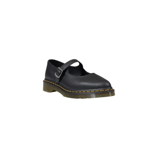 Chaussures Dr Martens pour femme, modèle Mary Jane en cuir noir, avec boucle argentée et surpiqûres jaunes le long de la semelle.