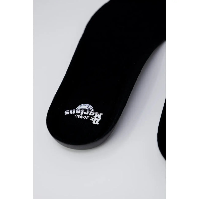 Dr Martens women black polyester shoes showcasing the back side design and durable construction