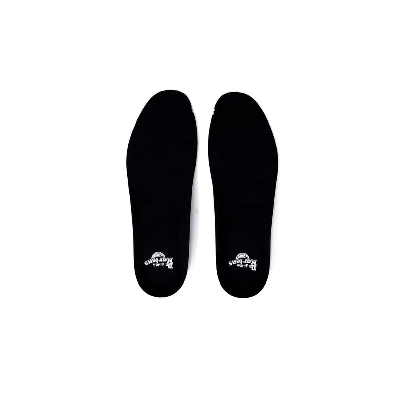 Black dr martens women polyester shoes showing the back side highlighting the sleek design and durable material