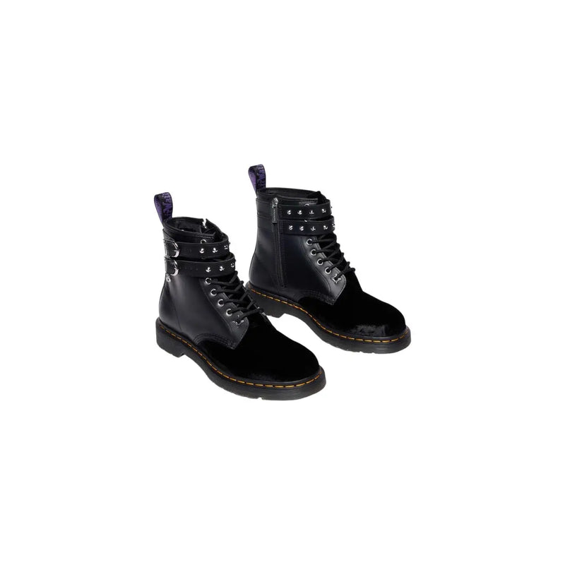 Black leather velvet zip women Dr Martens boots shown from the back side highlighting key design features