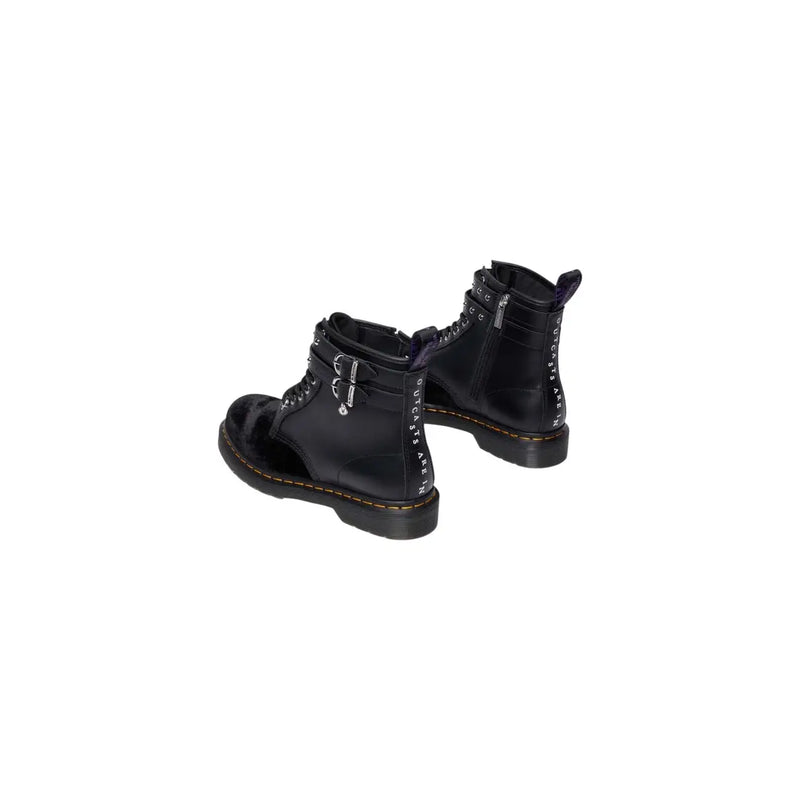 Black patent leather dr martens women boots with velvet zip showcasing the back side of the footwear