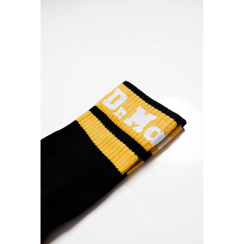 Chaussettes de sport noires et jaunes avec inscription blanche sur le dessus top Confectionnées en mélange de coton extensible pour femmes par Dr. Martens
