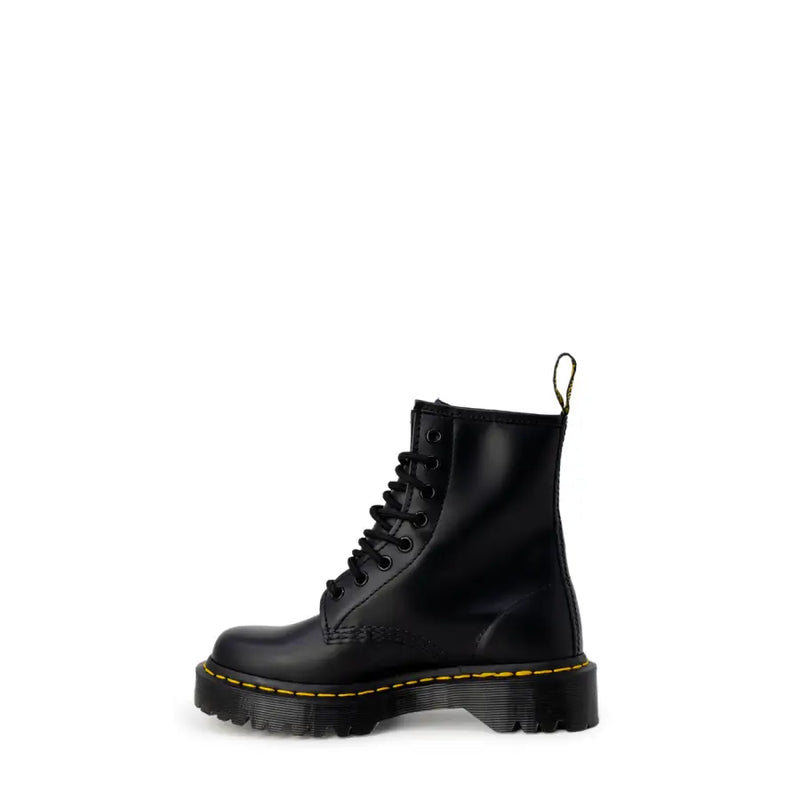 Dr Martens women’s black leather ankle boots shown from the back side, designed for fall and winter wear