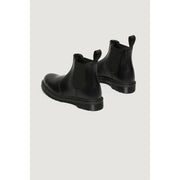 Dr. Martens womens black leather Chelsea boots with elastic panels and chunky rubber sole