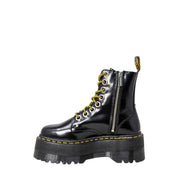 Dr Martens women’s black patent leather lace-up boots showing the back side of the footwear