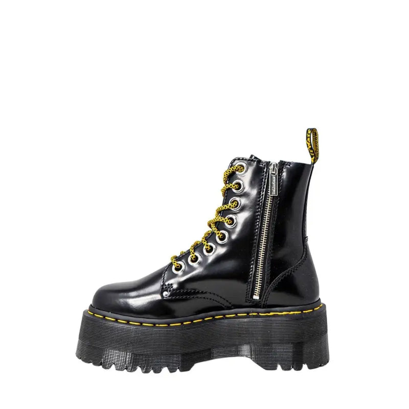 Dr Martens women’s black patent leather lace-up boots showing the back side of the footwear