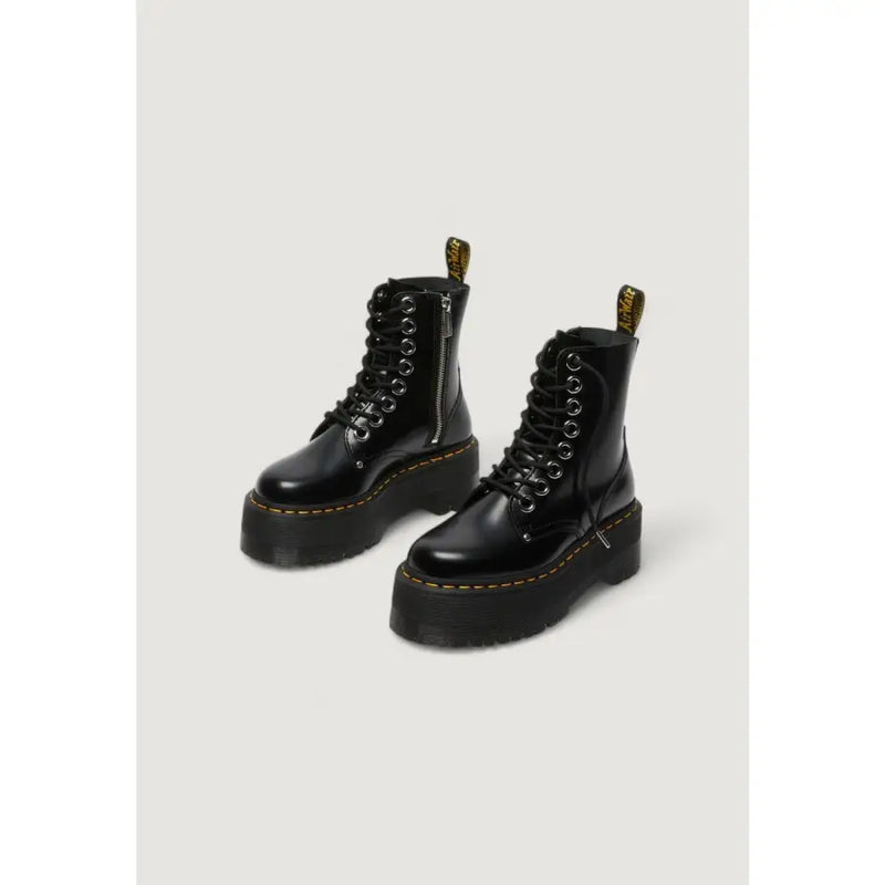 Black leather lace-up boots by dr martens for women showing front view with detailed stitching and laces