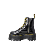 Dr Martens women’s black patent leather lace-up boots showing the back side of the footwear