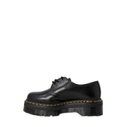 Dr Martens women’s black leather platform lace up shoe with yellow stitching and chunky sole