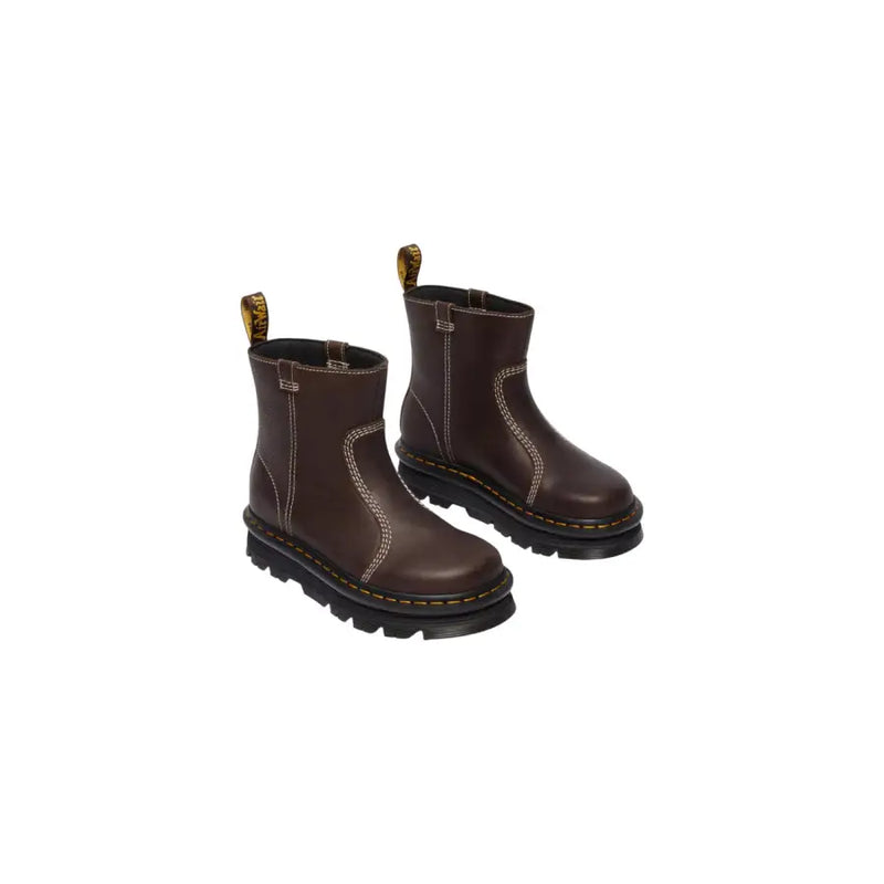 Dark brown leather ankle boots for women by dr martens shown from the back side emphasizing material and design