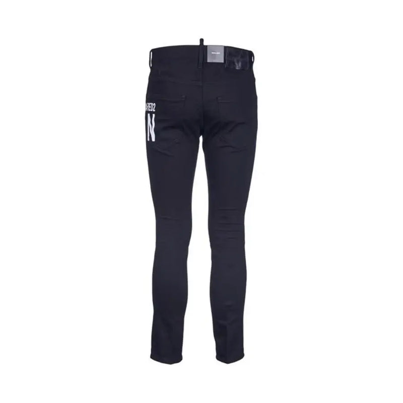 Jean slim noir Dsquared2, dos avec inscription blanche sur la poche, automne-hiver B44373, fermeture éclair et bouton.