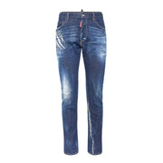 Blue distressed denim jeans with white paint splatter design, dsquared2 brand.
