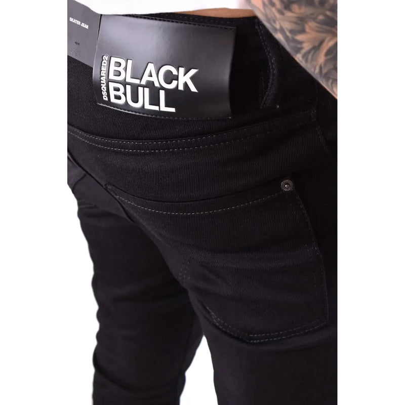 Jean Dsquared2 pour homme en denim noir avec empiècement en cuir noir et inscription « taureau » noire et blanche, vue de dos