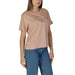 Dusty pink Calvin Klein Women’s cotton t-shirt paired with blue jeans, featuring a graphic design