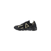 Baskets de sport EA7 pour homme, noires et beiges, avec logo géométrique doré et semelle épaisse texturée.
